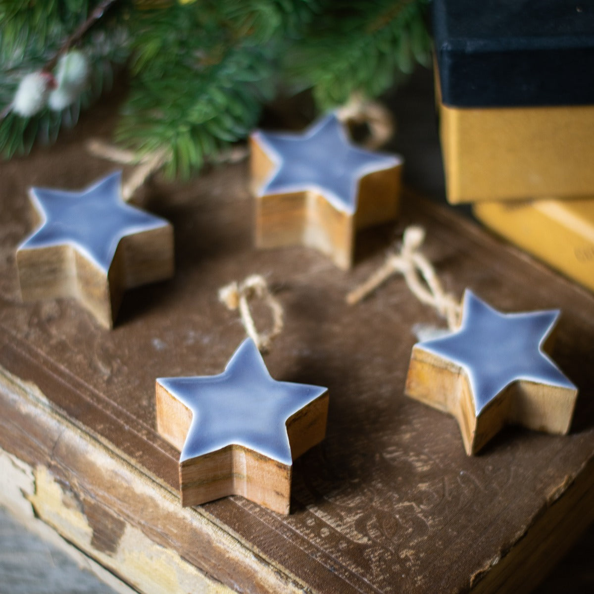 Set of Four Grey Wooden Star Decorations